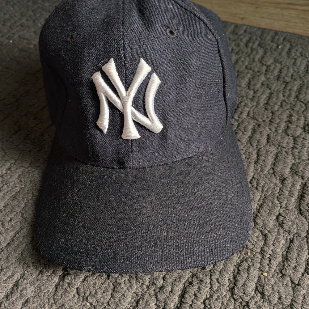 American Needle Navy Cap with Red Tag
